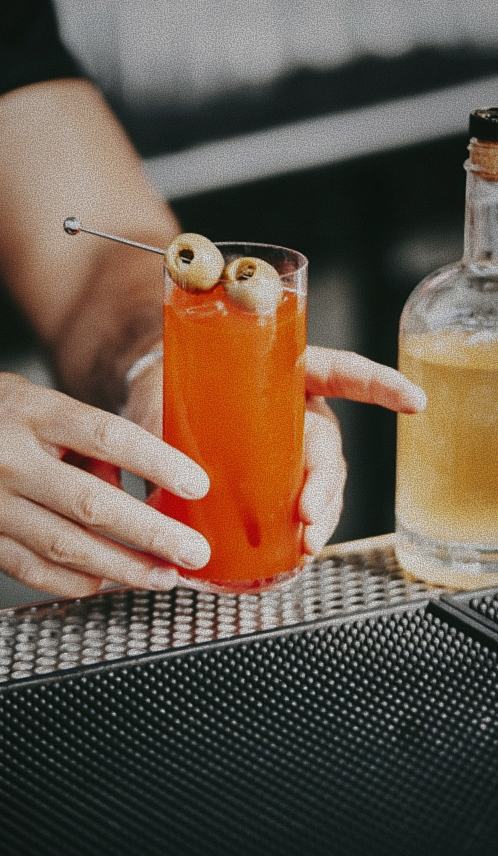 A cocktail being finished at the Spikes bar